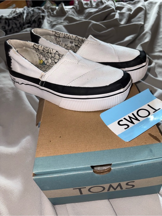 Toms Shoes - TOMS White Canvas Slip-On Shoes with Black Trim